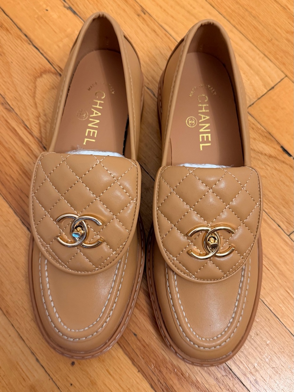 CHANEL Tan Quilted Leather CC Logo Loafers